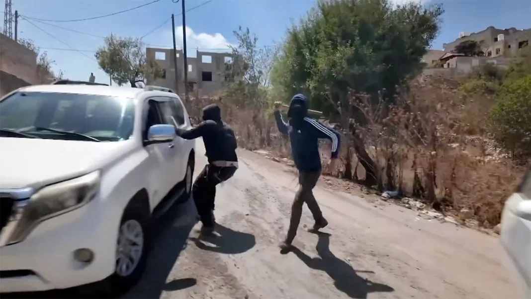 NBC News crew attacked by masked Israeli settlers in West Bank